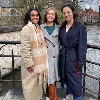 Three GT CIBER study abroad fellowship recipients pose for a photo in their host country.