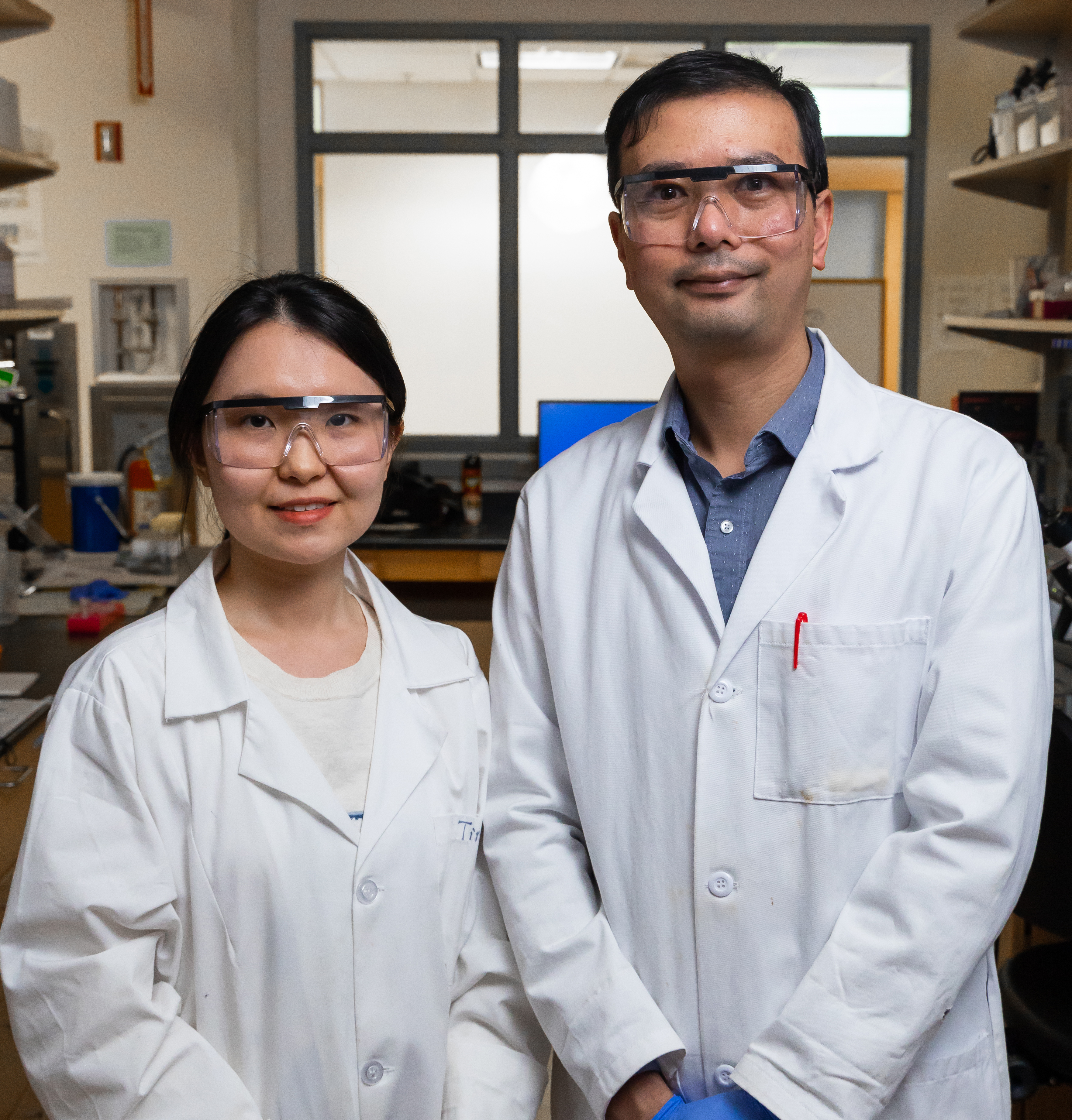 Xing Xie, the Carlton S. Wilder Assistant Professor in the School of Civil and Environmental Engineering, with his lab assistant. 