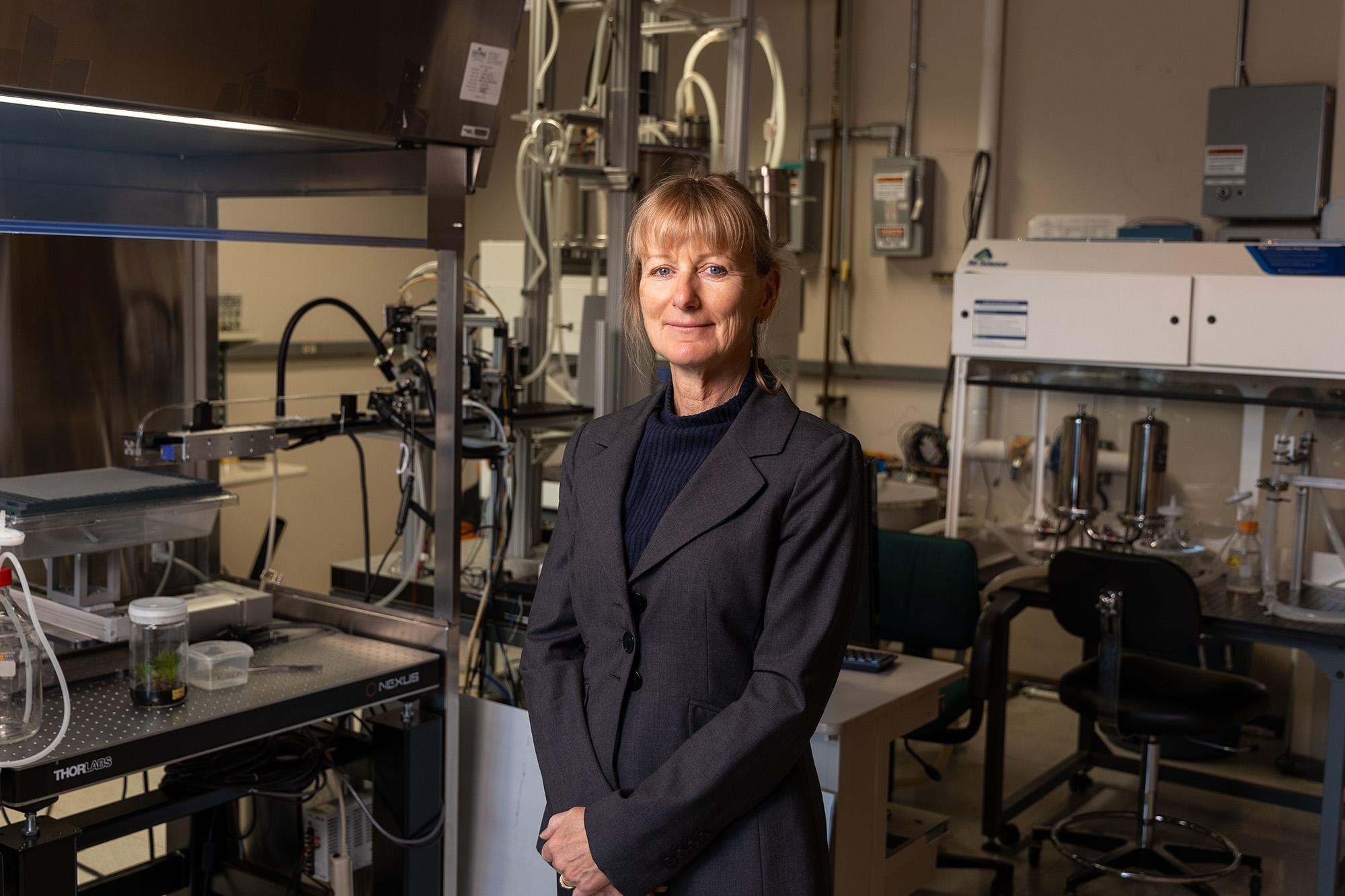 Ulrika Egertsdotter, a principal research scientist at the Renewable Bioproducts Institute and a renowned expert in seed cloning, designs and develops automated technologies that produce valuable plants for the state’s forestry, agriculture, and horticulture industries. (Credit: Chris McKenney)