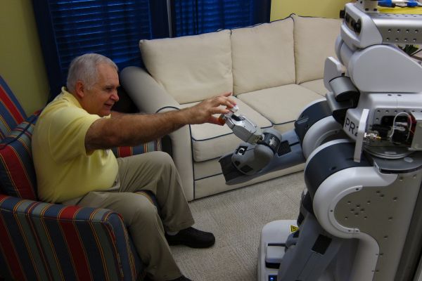 Robotics research for elder assistance in the Aware Home
