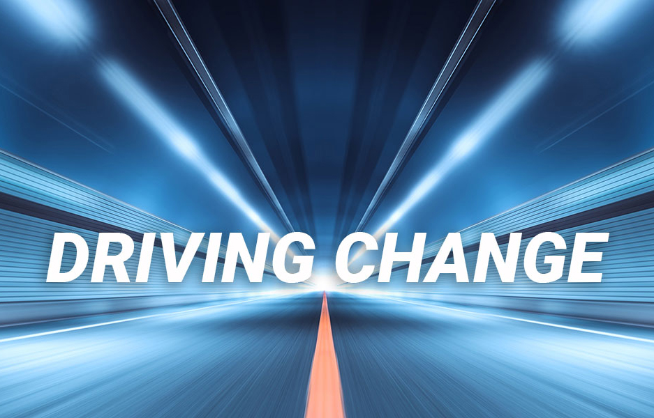 Graphical banner that says "Driving Change."