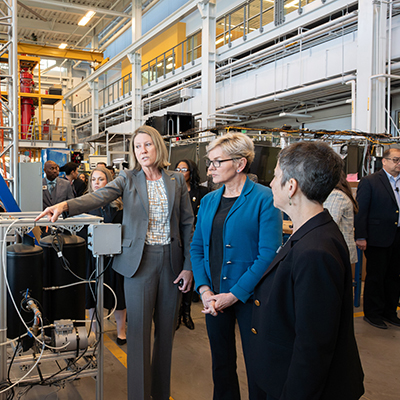 Georgia Tech's associate vice president for Research Operations and Infrastructure, Krista Walton, explains direct air capture technology to U.S. Secretary of Energy Jennifer Granholm.