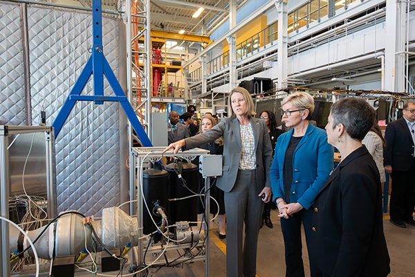 Georgia Tech's associate vice president for Research Operations and Infrastructure, Krista Walton, explains direct air capture technology to U.S. Secretary of Energy Jennifer Granholm.