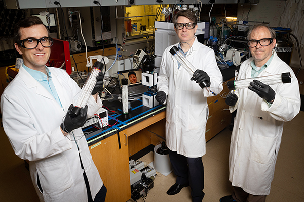 Ryan Lively, Christopher Jones, and Matthew Realff in one of Georgia Tech's direct air capture labs.