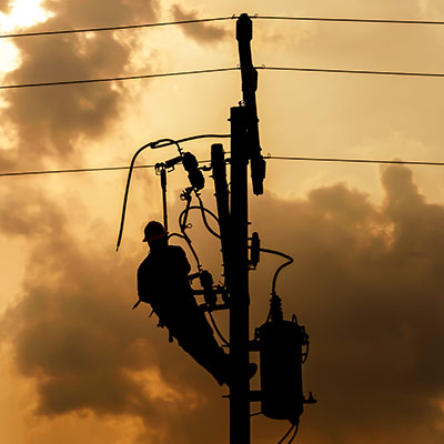 linemen repairing the grid during a power outage