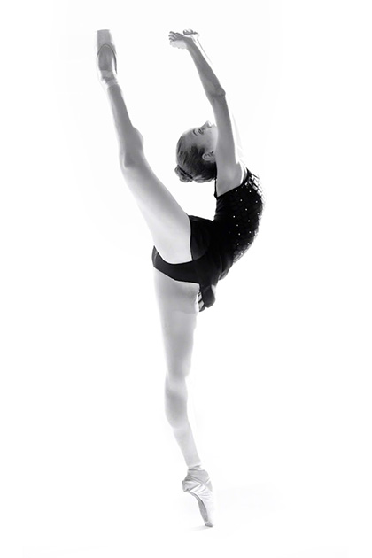 black and white photo of a single ballerina