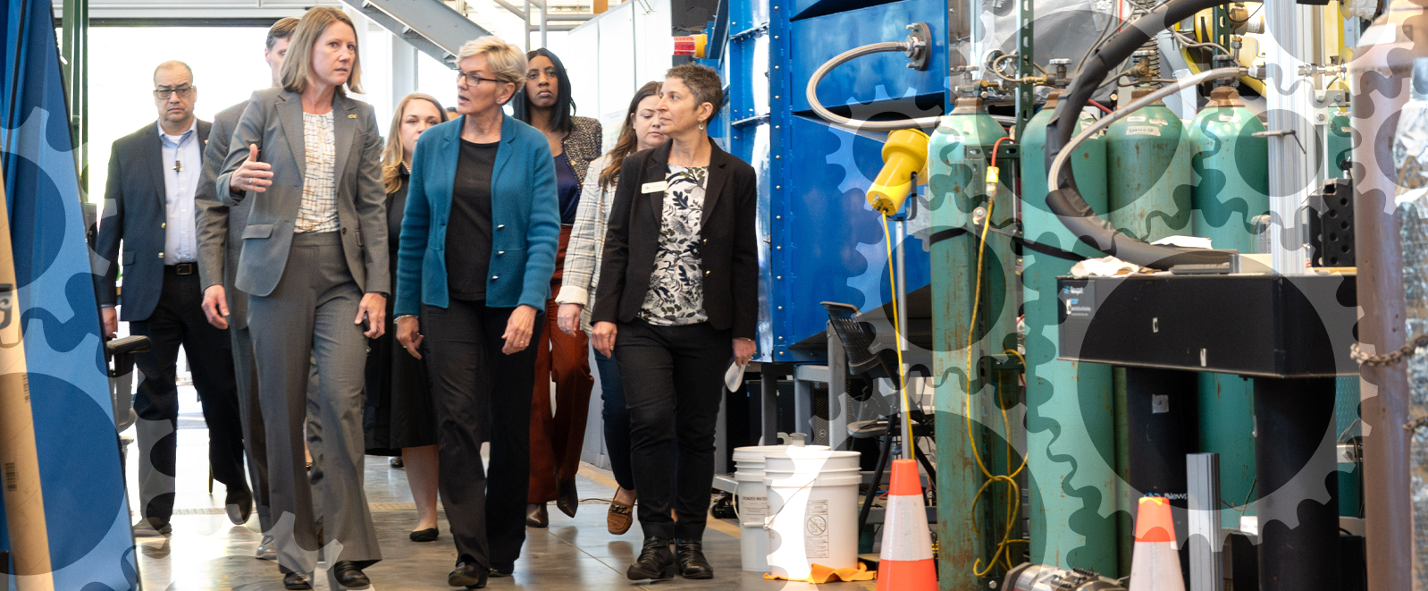 Krista Walton leads a group of U.S. Secretary of Energy representatives on a tour through a Georgia Tech lab.