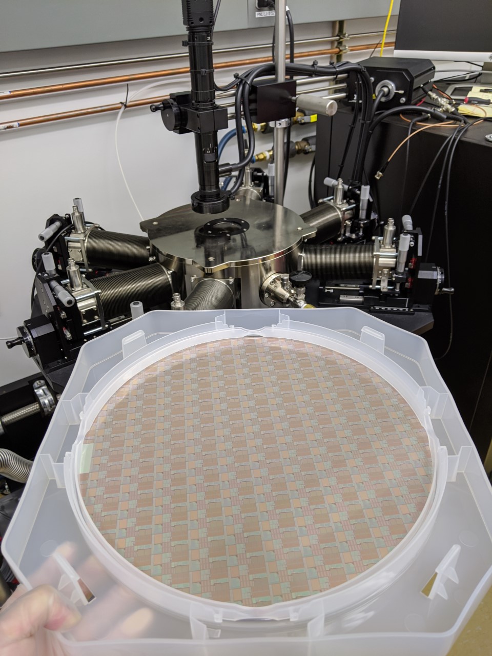 A 300mm silicon wafer with advanced memory technologies from Georgia Tech’s industry partner for device characterization to be performed at Georgia Tech’s facilities. (Photo credit: Shimeng Yu, Georgia Tech)