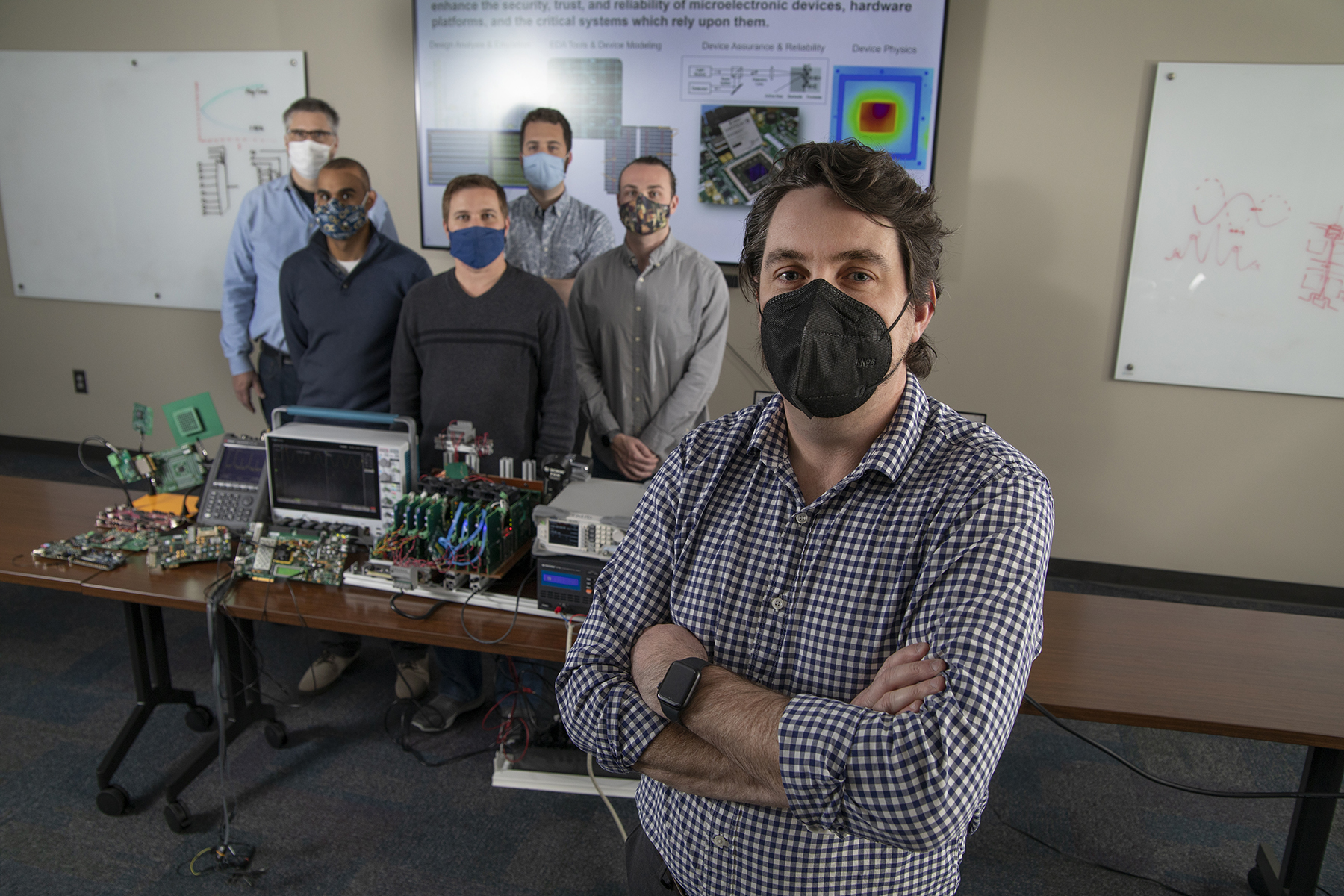(L to R): Bill Hunter, Mike Ruiz, Chris Clark, Jay Danner, Will Stuckey and Lee W. Lerner― the leadership team of a division of faculty at GTRI, which advances applied research in hardware security and trust. (Photo credit: Christopher Moore, Georgia Tech) 