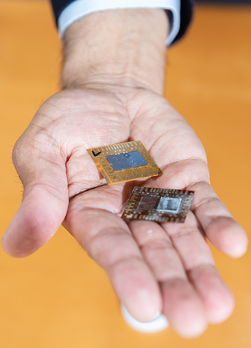 Closeup image of chips in a Georgia Tech researcher's palm.