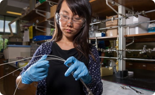 graduate research assistant assembles a module