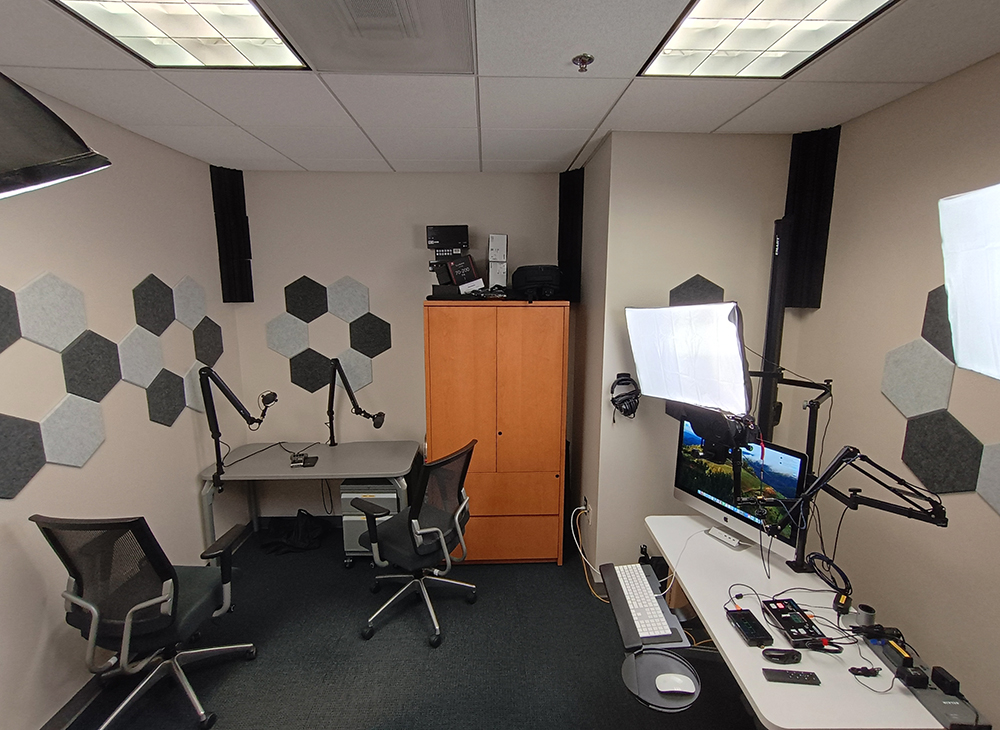 A small office equipped as a audio and video production studio.