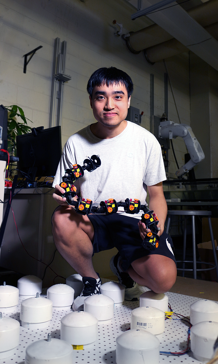 Tianyu Wang, a robotics Ph.D. student in the Institute for Robotics and Intelligent Machines and the George W. Woodruff Schof Mechanical Engineeol oring.