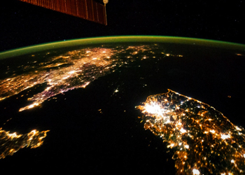 A view of city lights from Earth's orbit.