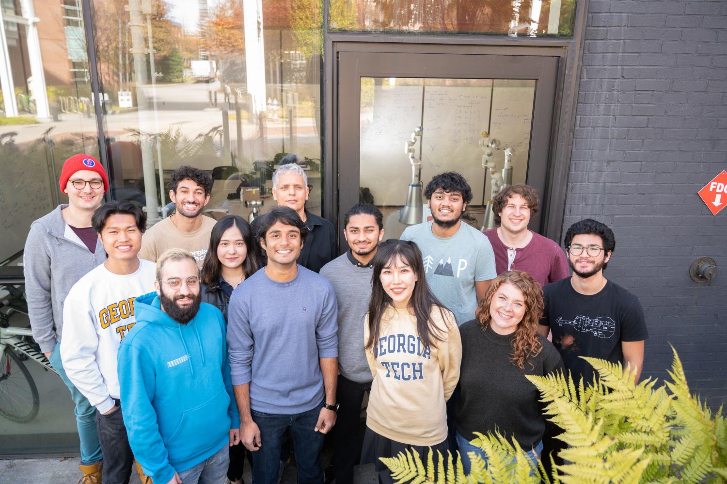 The Georgia Tech Center for Music Technology research team behind FOREST (L to R)  (Back row): Richard Savery, Michael Verma, Gil Weinberg, Raghav Sankaranarayanan, and Amit Rogel. (Middle row): Jumbo Jiahe, Rose Sun,  Nikhil Krishnan, and Sean Levine. (Front row): Mohammad Jafari,  Nitin Hugar, Qinying Lei, and Jocelyn Kavanagh. (Photo credit: Allison Carter, Georgia Tech)