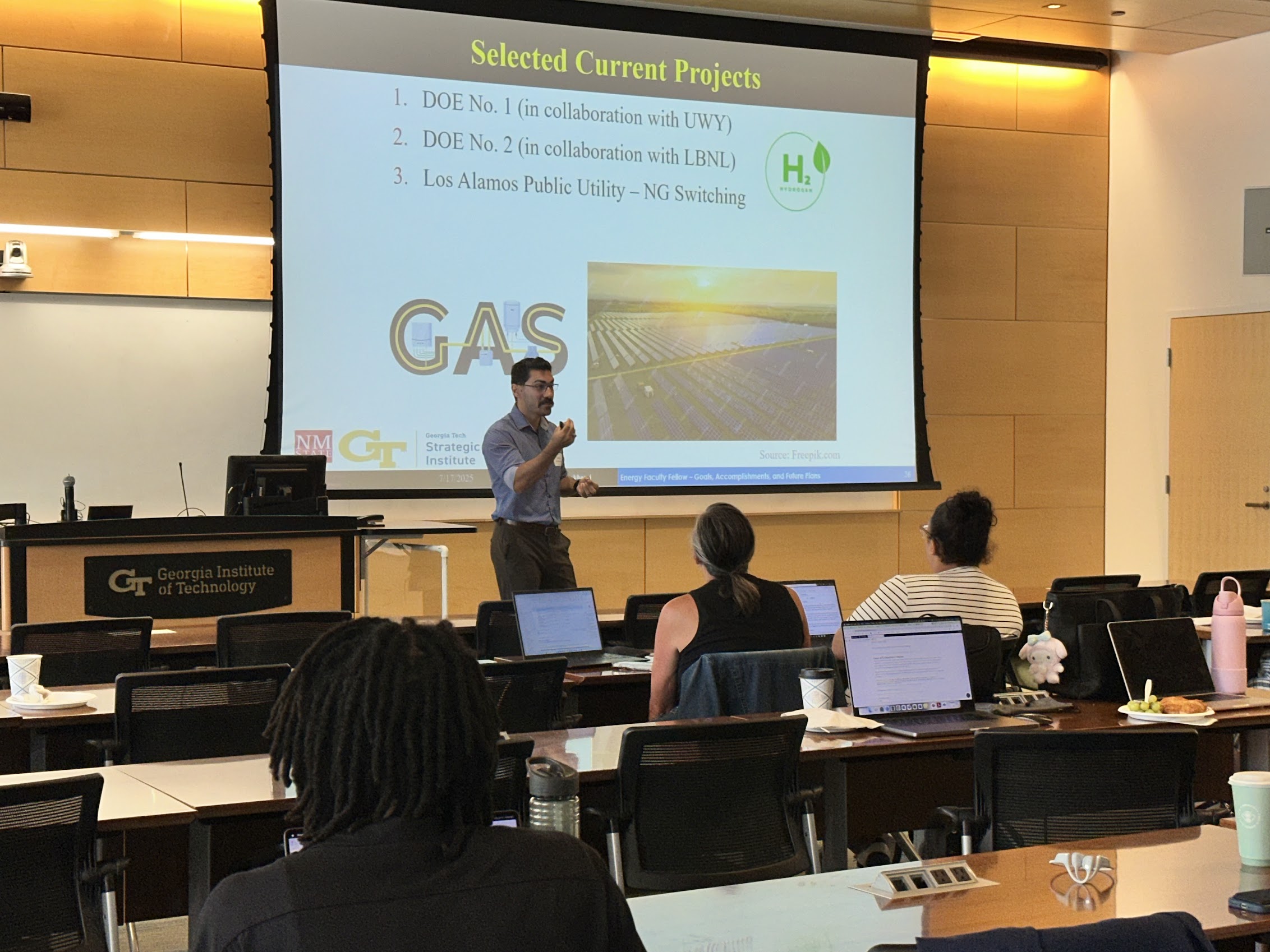 Jamal Mamkhezri, Associate Professor of Economics, New Mexico State University presenting during the last day of the 10 week Faculty Fellow Programprogram