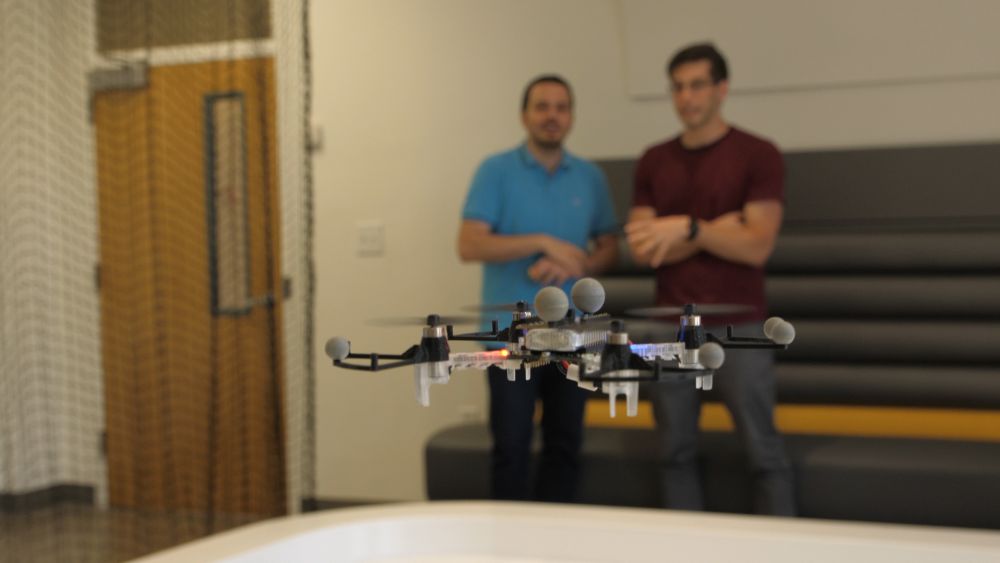 Students with a drone in test-flight