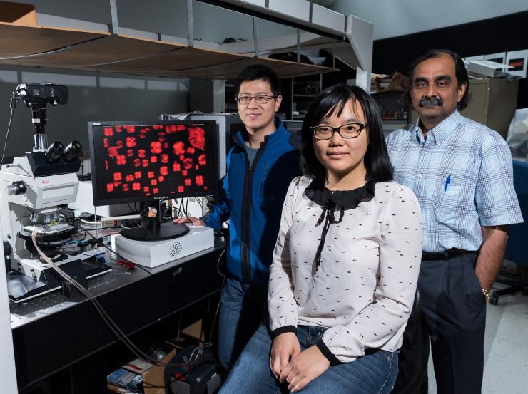<p>Georgia Tech students Jinxin Fu and Rui Chang with Mohan Srinivasarao, a professor in the Georgia Tech School of Materials Science and Engineering (Credit: Rob Felt)</p>