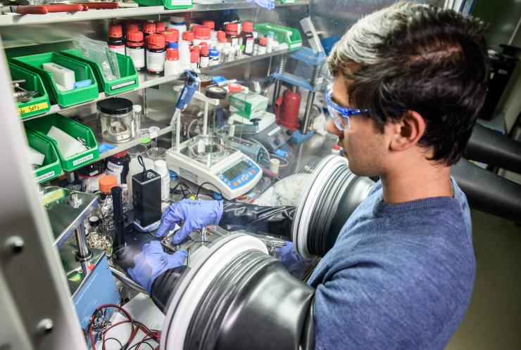 <p>Dhruv Prakash, a student at Georgia Tech, works in a laboratory focused on battery research. (Credit: Rob Felt)</p>