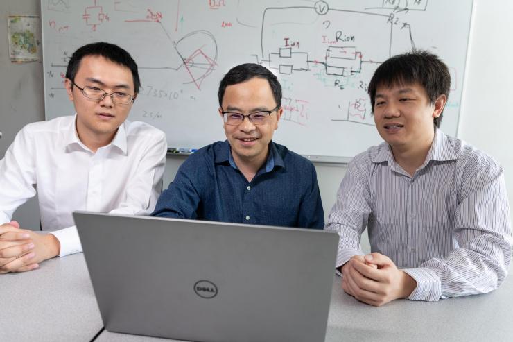 <p>Yin Zhang, a graduate student, Ting Zhu, a professor in the George W. Woodruff School of Mechanical Engineering at Georgia Tech, and Dengke Chen, a postdoctoral researcher, have helped develop a new process to gain insights into individual high-entropy alloys and help characterize their properties. (Credit: Rob Felt)</p>