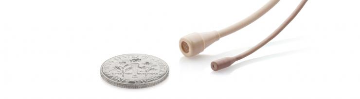 <p>B3 and B6 lavalier microphones with a dime for size comparison.</p>