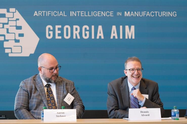 <p>Dennis Alvord (right), the Economic Development Administration’s deputy assistant secretary for economic development and chief operating officer, reacts to comment during a roundtable discussion with members of the Georgia AIM coalition, a multi-program effort being led by Georgia Tech to bolster innovation in manufacturing and artificial intelligence. (PHOTO: Joya Chapman)</p>