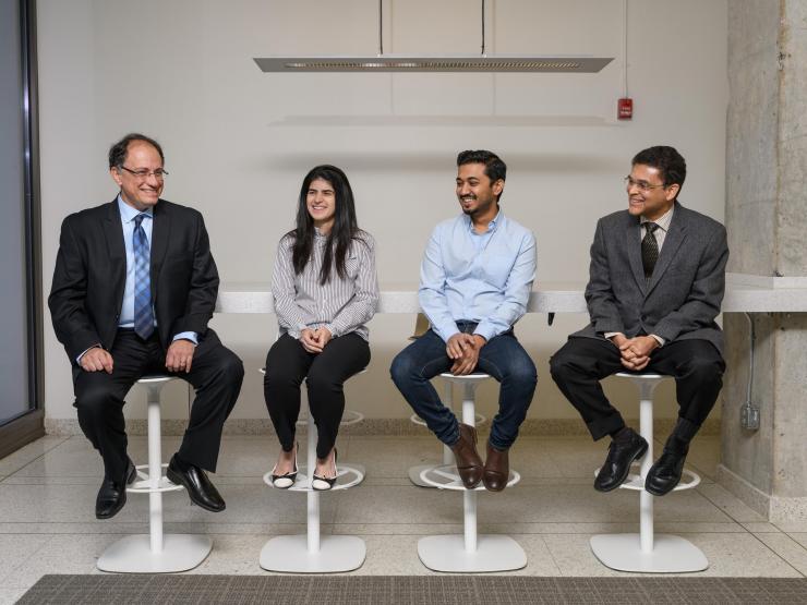 <p>From left to right: Manos Tentzeris, the Ken Byers Professor in Flexible Electronics in the Georgia Tech School of Electrical and Computer Engineering, Larissa Novelino, a Georgia Tech graduate student, Abdullah Nauroze, a Georgia Tech graduate student, Glaucio Paulino, the Raymond Allen Jones Chair of Engineering and a professor in the Georgia Tech School of Civil and Environmental Engineering (Credit: Rob Felt)</p>