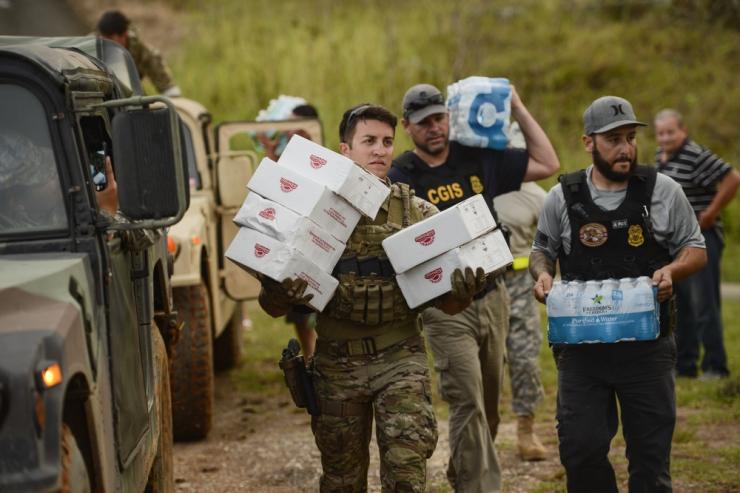 <p>FEMA workers distribute aid in Puerto Rico in the aftermath of Hurricane Irma in 2017. Credit: FEMA.gov</p>