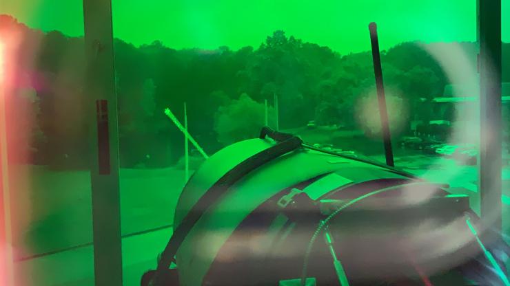 <p>Bullet Time is an optical tracking technology developed by GTRI researchers that uses a LIDAR system (pictured) to track small, airborne targets in cluttered environments. The technology could help protect warfighters against the recent surge in unauthorized drones that are becoming increasingly difficult to identify and address (Credit: Brandon Vaughan)</p>