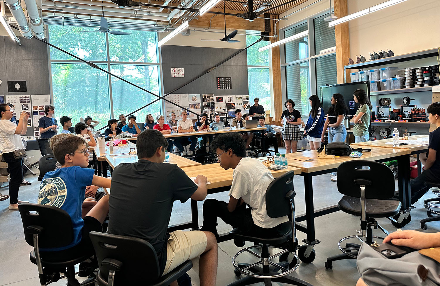 Students group presenting their mini-project on the final day of the camp