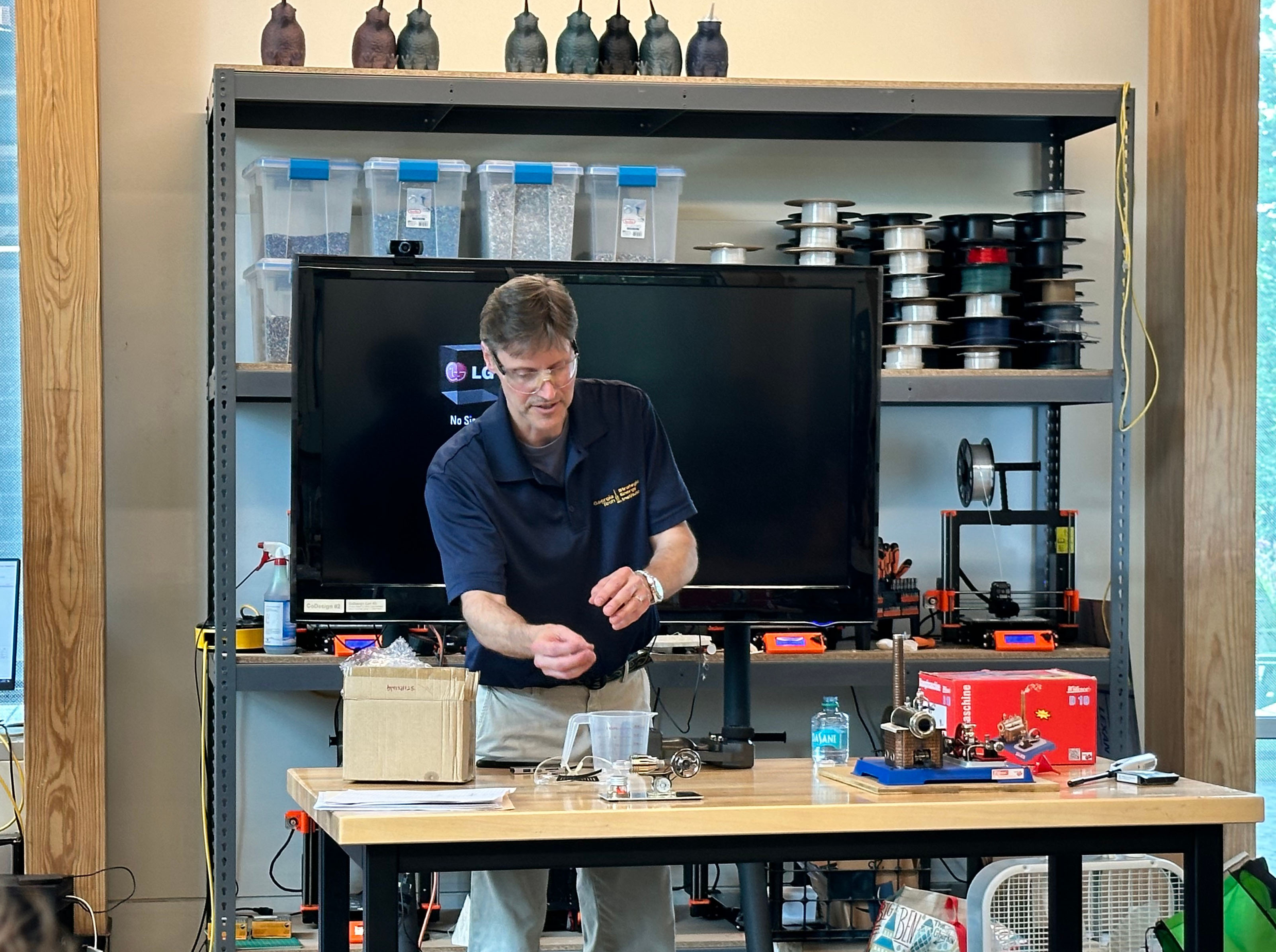 Rich Simmons demonstrating an experiment at the Energy Unplugged summer camp