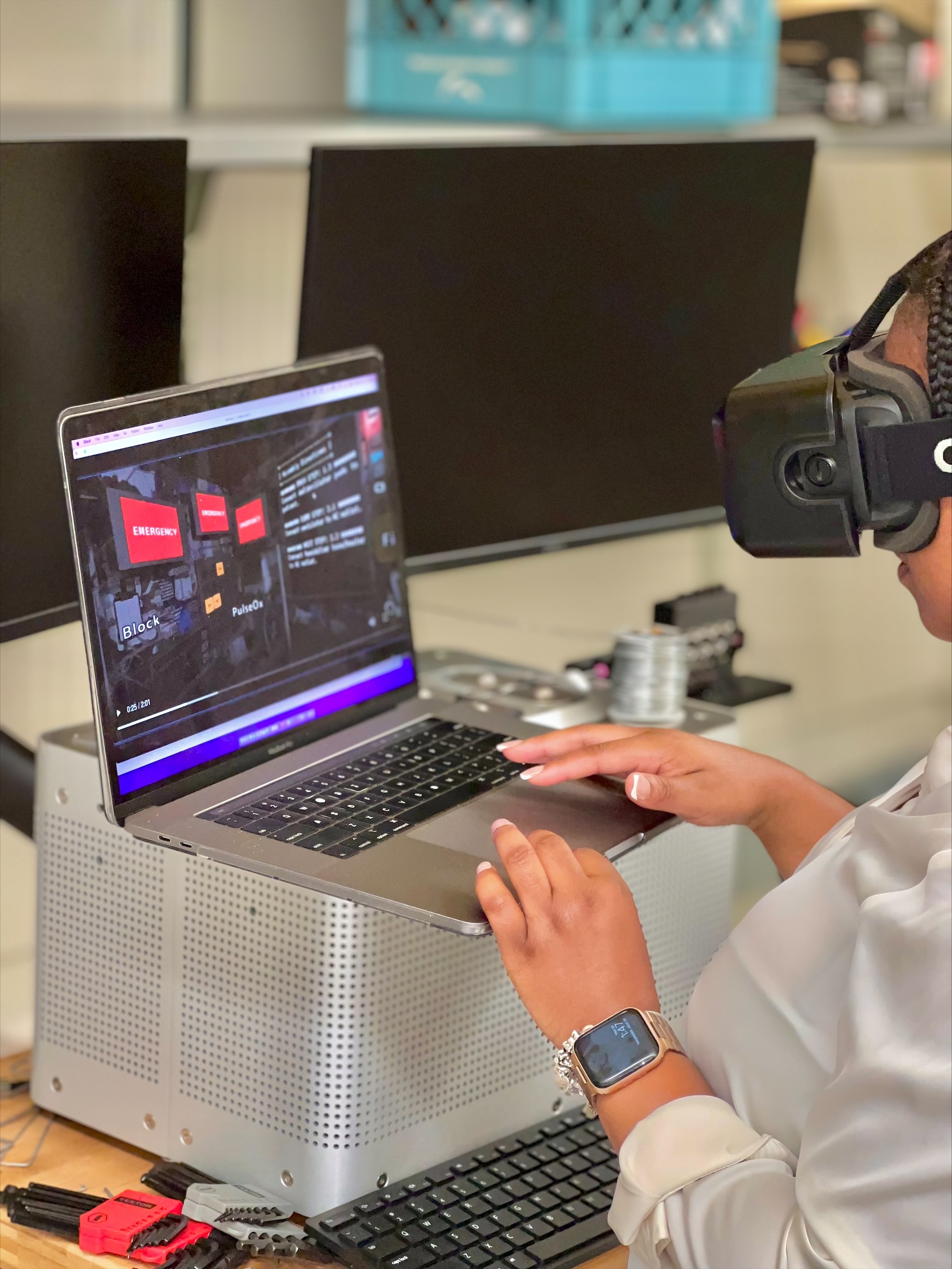 <p>Kala Jordan-research engineer II-using a VR/AR headset.</p>