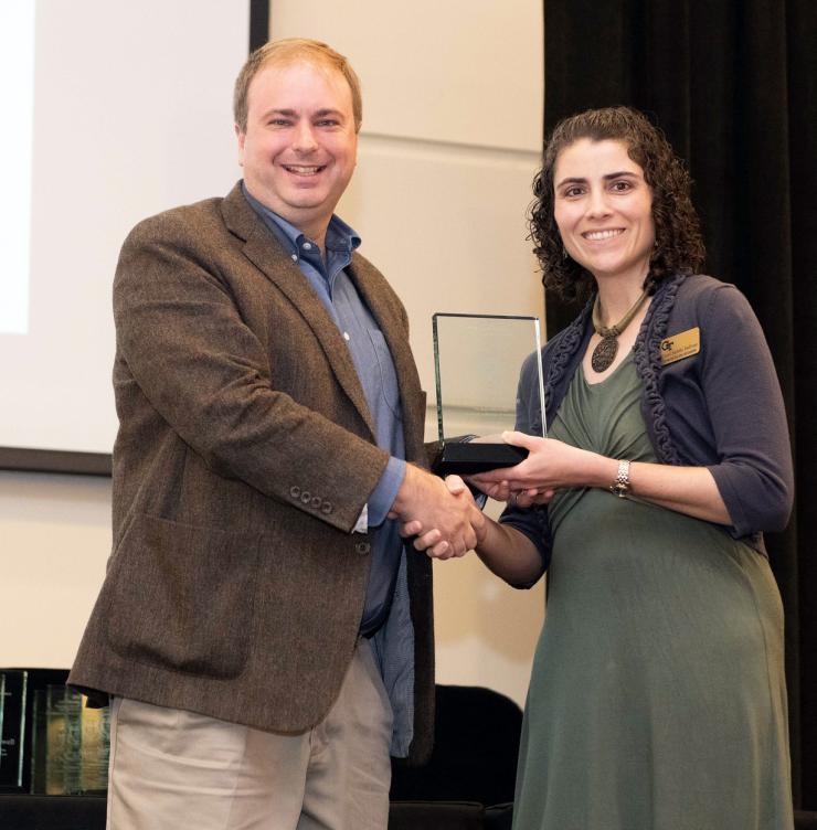 <p>Joe Lachance acceps his award from Carol Subiño Sullivan of the Center for Teaching and Learning at Georgia Tech.</p>