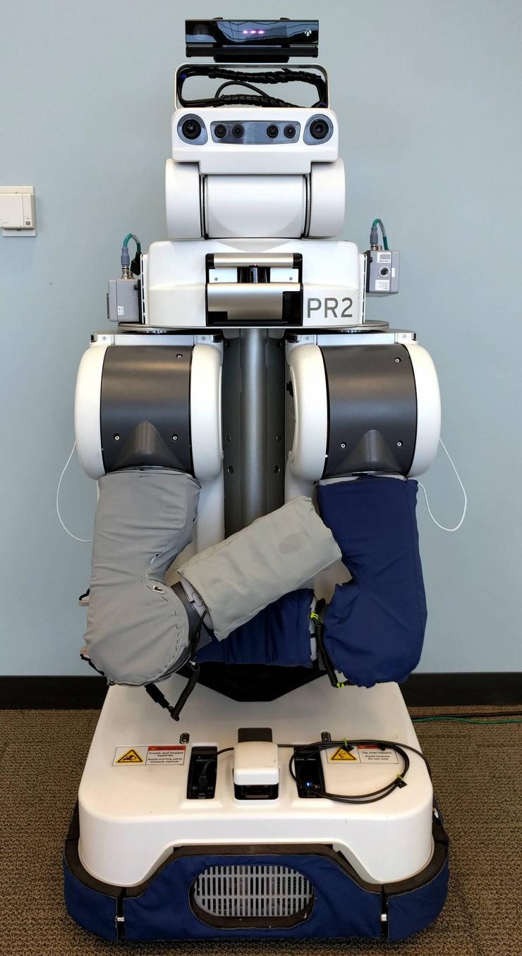 <p>The PR2 is a research and development robot that has two arms and a head on a wheeled base that allows it to move around the environment. (Credit: Phillip Grice, Georgia Tech)</p>