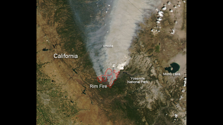 <p>A NASA plane stocked with an orchestra of instrumentation flew a team of researchers through the turbulent plumes of wildfires, including the Rim Fire, the third-largest wildfire in California's history. Credit: Jeff Schmaltz LANCE/EOSDIS MODIS Rapid Response Team, GSFC via NASA</p>