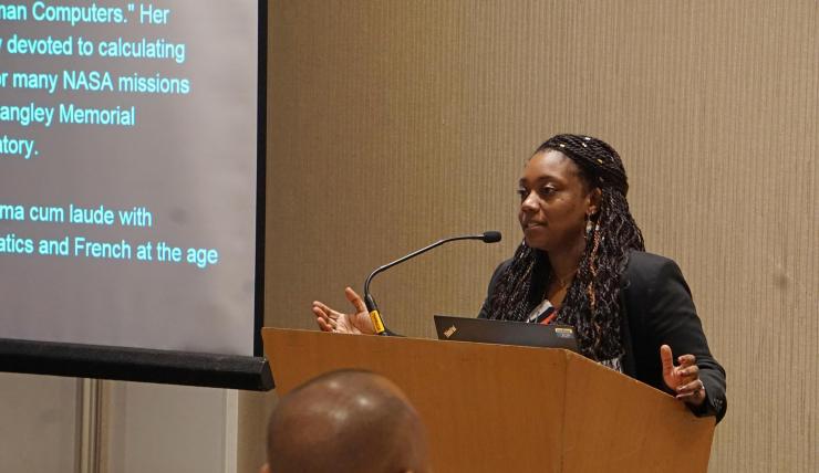 <p>Simone Douglas, a graduate researcher from Georgia Tech, makes her presentation at AfroBiotech.</p>