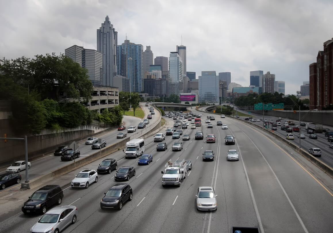 Traffic flows in and out of downtown Atlanta on the I-75/I-85 Connector Thursday, May 19, 2016, in Atlanta. (AP Photo/John Bazemore)