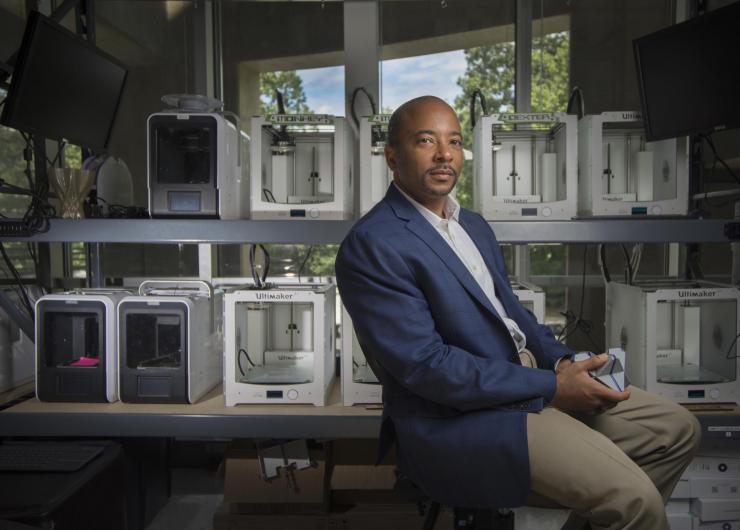 <p>Raheem Beyah, the Motorola Foundation Professor and associate chair in Georgia Tech’s School of Electrical and Computer Engineering, is shown in a 3-D printing lab at the Woodruff School of Mechanical Engineering. (Credit: Christopher Moore, Georgia Tech)</p>