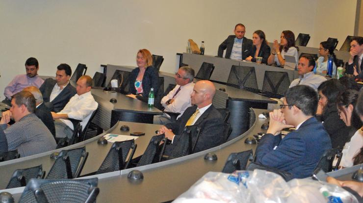 <p>An audience of experts, including Petit Institute Executive Director Bob Guldberg (center), offered feedback and support to MBID students during final presentations.</p>