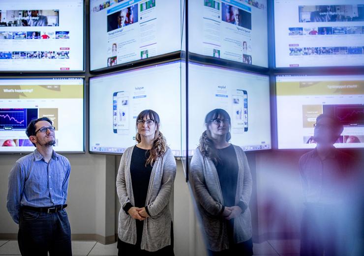 <p>Researchers Erica Briscoe and Zsolt Kira are creating a high-performance system that automatically detects real-world events across multiple news sources — and could ultimately help forecast future behavior. (Credit: Branden Camp, Georgia Tech)</p>