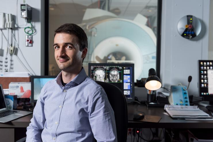 <p>Researcher Dobromir Rahnev, who led the study, sits in the Georgia Tech control room of a functional MRI scanner much like the one used at the University of California, Berkeley for experiments on the frontal cortex's role in creating vision.</p>