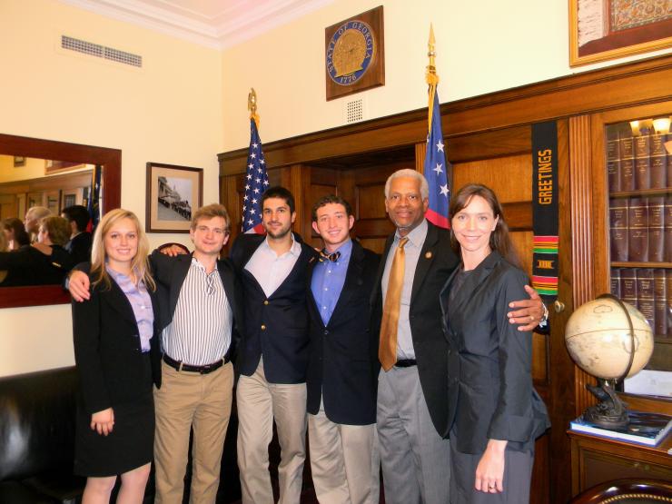 <p>Mary Shoemaker, Tyler Folse, James Barazesh, Mitchell Blenden, Congressman Hank Johnson and Professor Kim Cobb discuss the students' ideas for reducing carbon emissions in the representative's office in Washington, D.C. The students won this year's Carbon Reduction Challenge in Cobb's earth and atmospheric sciences course.</p>
