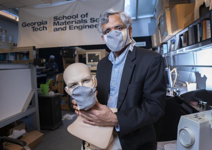 <p>Georgia Tech professor Sundaresan Jayaraman with prototypes of the redesigned face mask. (Credit: Christopher Moore, Georgia Tech)</p>
