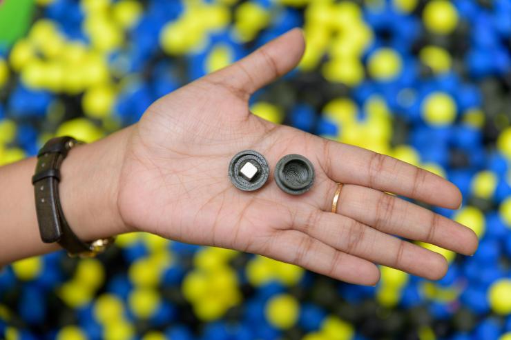 <p>Georgia Tech researchers used 3D printing techniques to create hollow spheres in which loose magnets were placed. The spheres simulated moist soil for testing the work strategies of robots. (Credit: Rob Felt, Georgia Tech)</p>