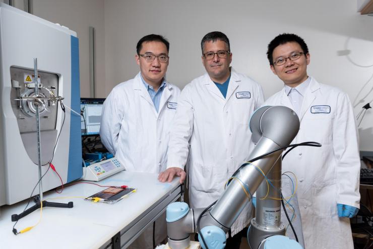 <p> Georgia Tech researchers have harnessed triboelectric nanogenerators to improve the sensitivity of mass spectrometry, a widely-used chemical analysis technique. Shown are Anyin Li, a postdoctoral fellow in the School of Chemistry and Biochemistry, Facundo Fernández, a professor in the School of Chemistry and Biochemistry, and Yunlong Zi, a postdoctoral fellow in the School of Materials Science and Engineering  (Credit: Rob Felt, Georgia Tech)</p>