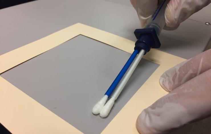 <p>Image shows how samples were taken from airline tray tables to study the microbiome of aircraft. (Credit: John Toon, Georgia Tech).</p>

<p> </p>