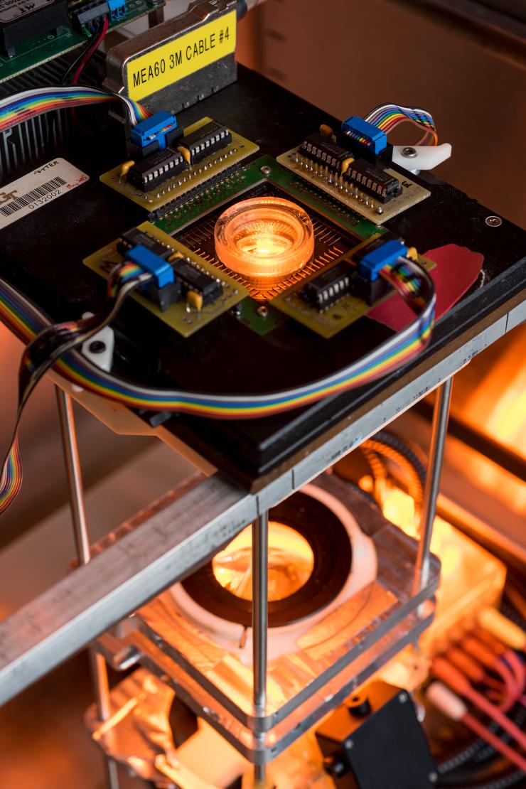 <p>This image shows the full stimulation light train of the optoclamp, which uses a computer to acquire and process the neuronal response to optical stimuli in real-time and then vary the light input to maintain a desired firing rate. (Credit: Rob Felt, Georgia Tech)</p>