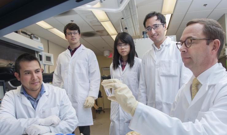<p>The leading team of scientists at Georgia Tech that developed the new solution-based electrical doping technique for organic semiconductors. Shown are (l-r) senior research scientist Canek Fuentes-Hernandez; graduate students Vladimir Kolesov, Wen-Fang Chou, Felipe Larrain; and professor Bernard Kippelen.  (Credit: Christopher Moore, Georgia Tech)</p>