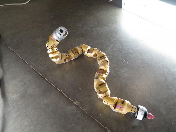 <p>Researchers used what they learned from observations of sidewinder snakes to improve the operation of this snake robot, which was developed at Carnegie Mellon University. (Courtesy Carnegie Mellon University)</p>