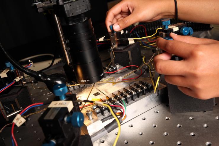 <p>Electrical conductivity is measured for a thermoelectric polymer film in the laboratory of Shannon Yee at the Georgia Institute of Technology. (Credit: Candler Hobbs, Georgia Tech).</p>